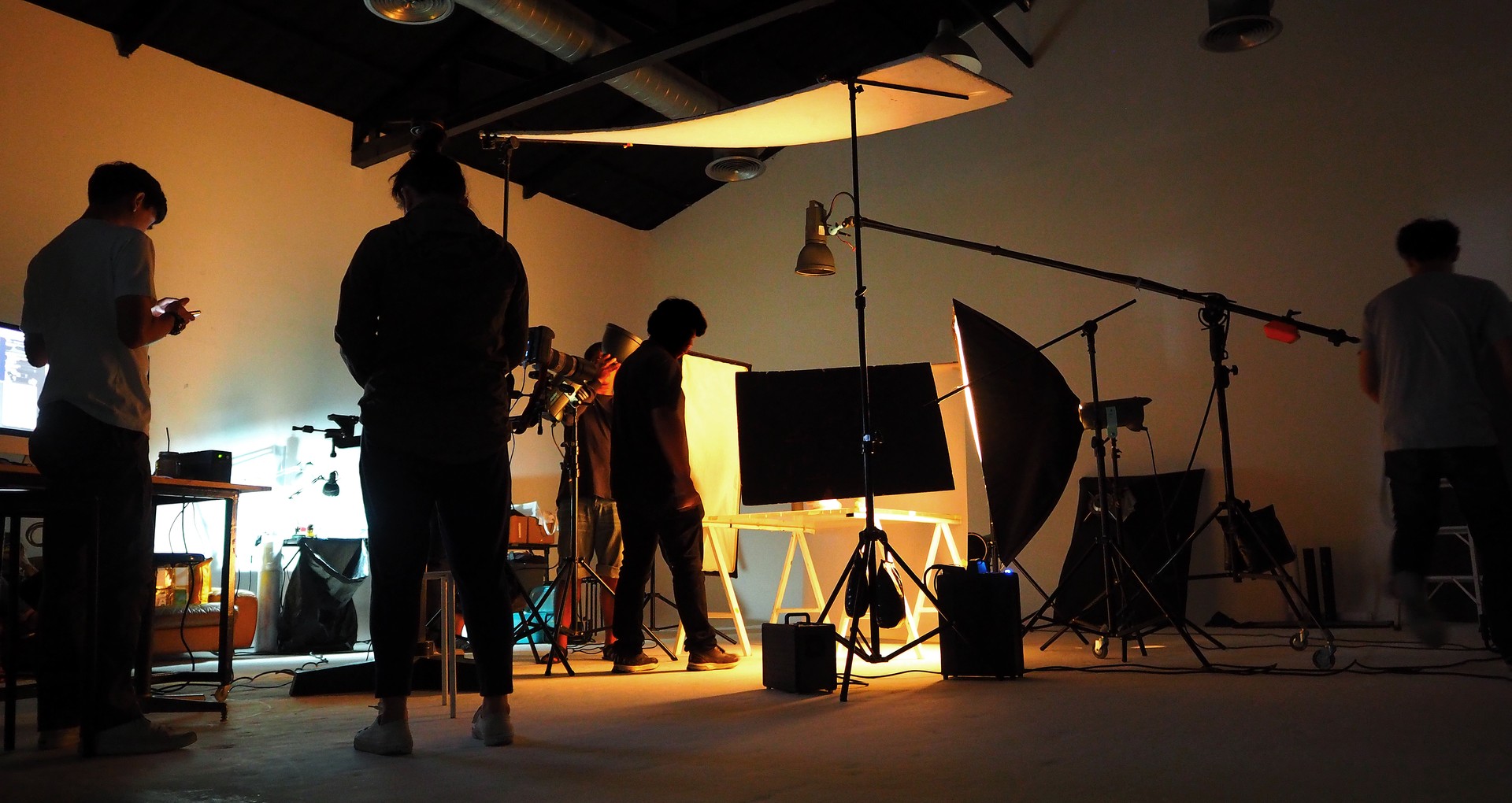 Production team shooting some video movie for tv commercial with studio equipment set.